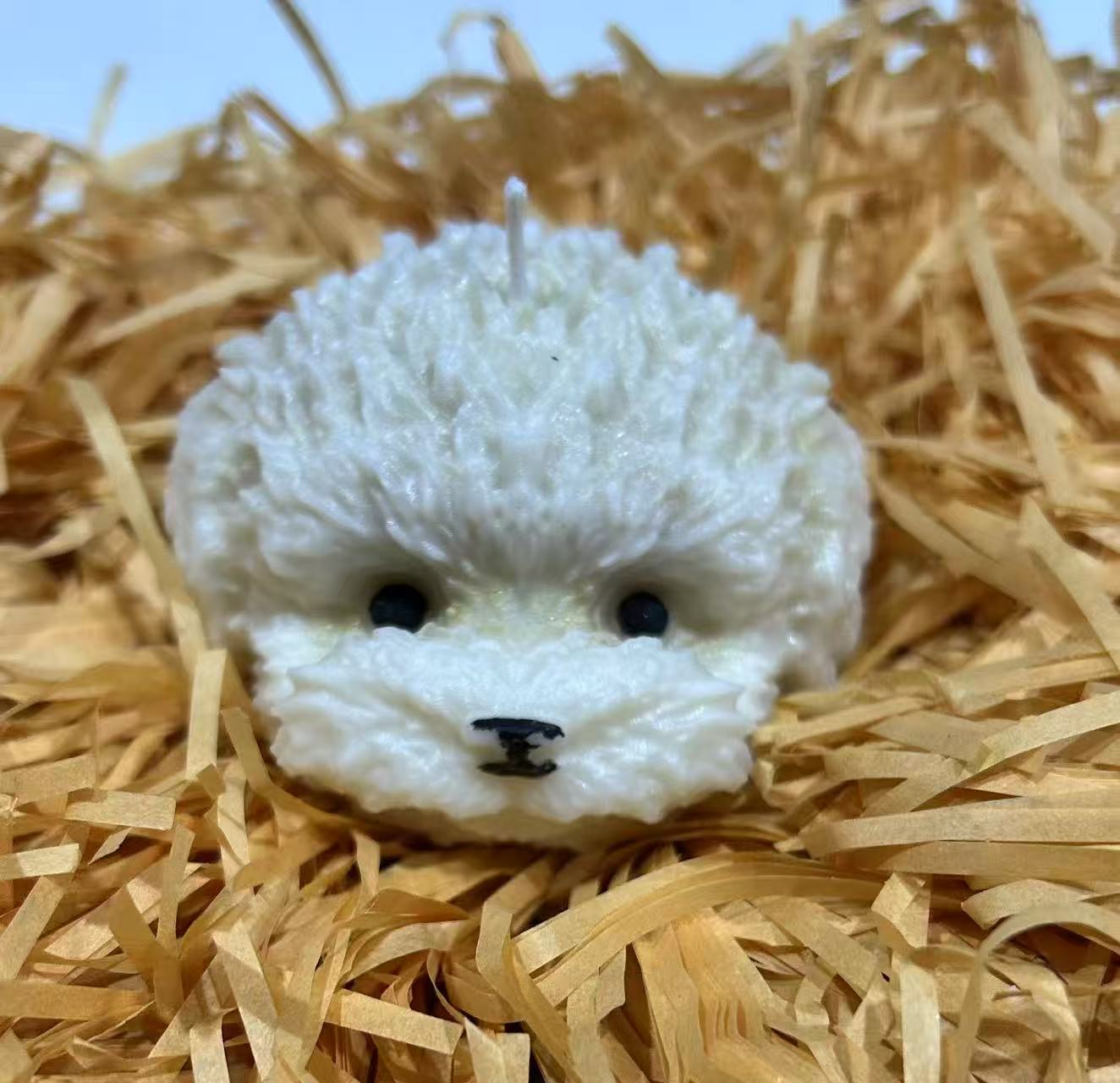 Small puppy-shaped candle